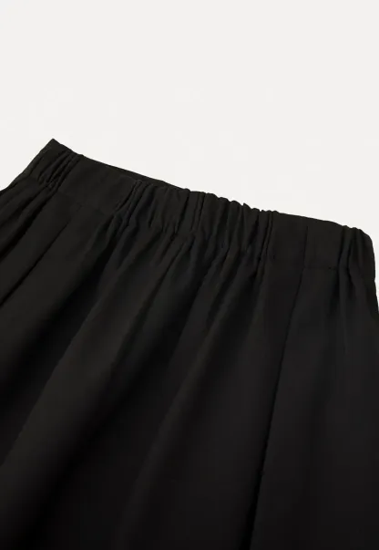 Elegant Pleated Midi Skirt with Flared Design