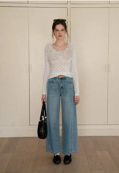 Polka dot long sleeve top with ruffled neckline