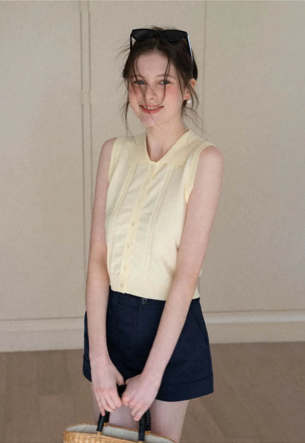 Sleeveless Knit Top with Collar and Buttons