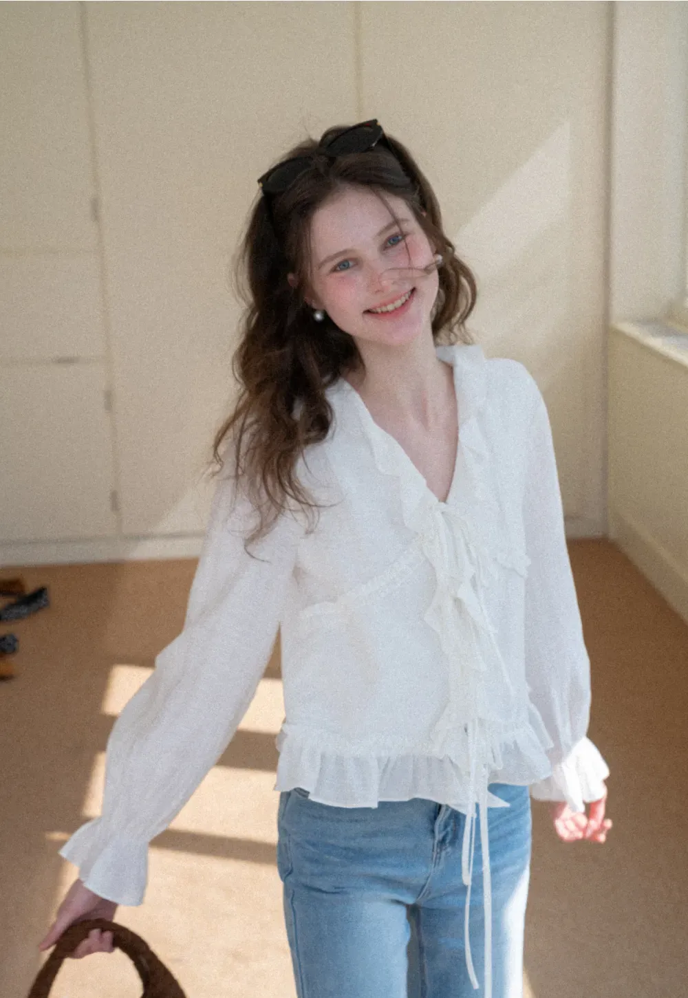 Elegant Blouse with Ruffle Detail and Tie Front Design