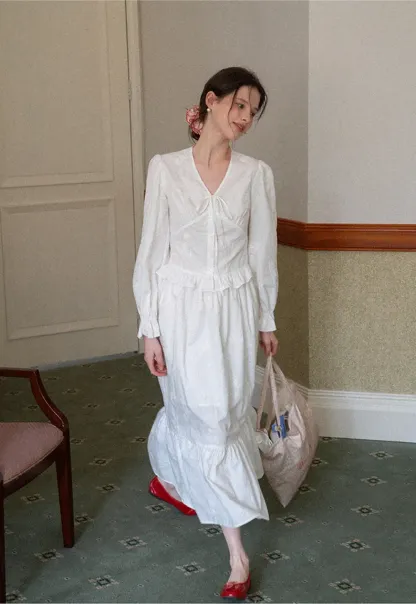 Shirt with ruffled sleeves and layered skirt