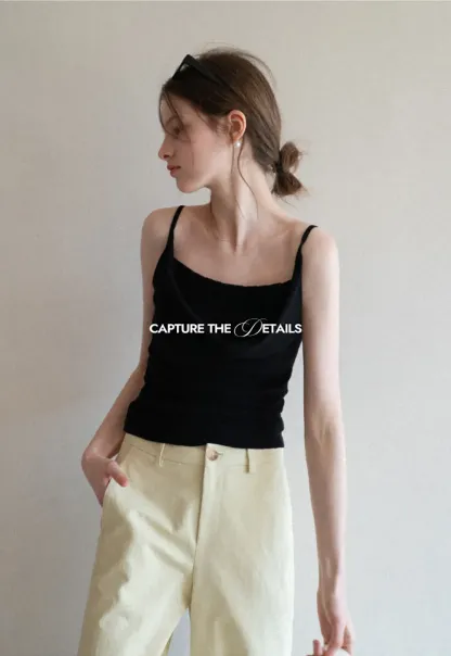 Silk-like tank top with thin straps and draped neckline