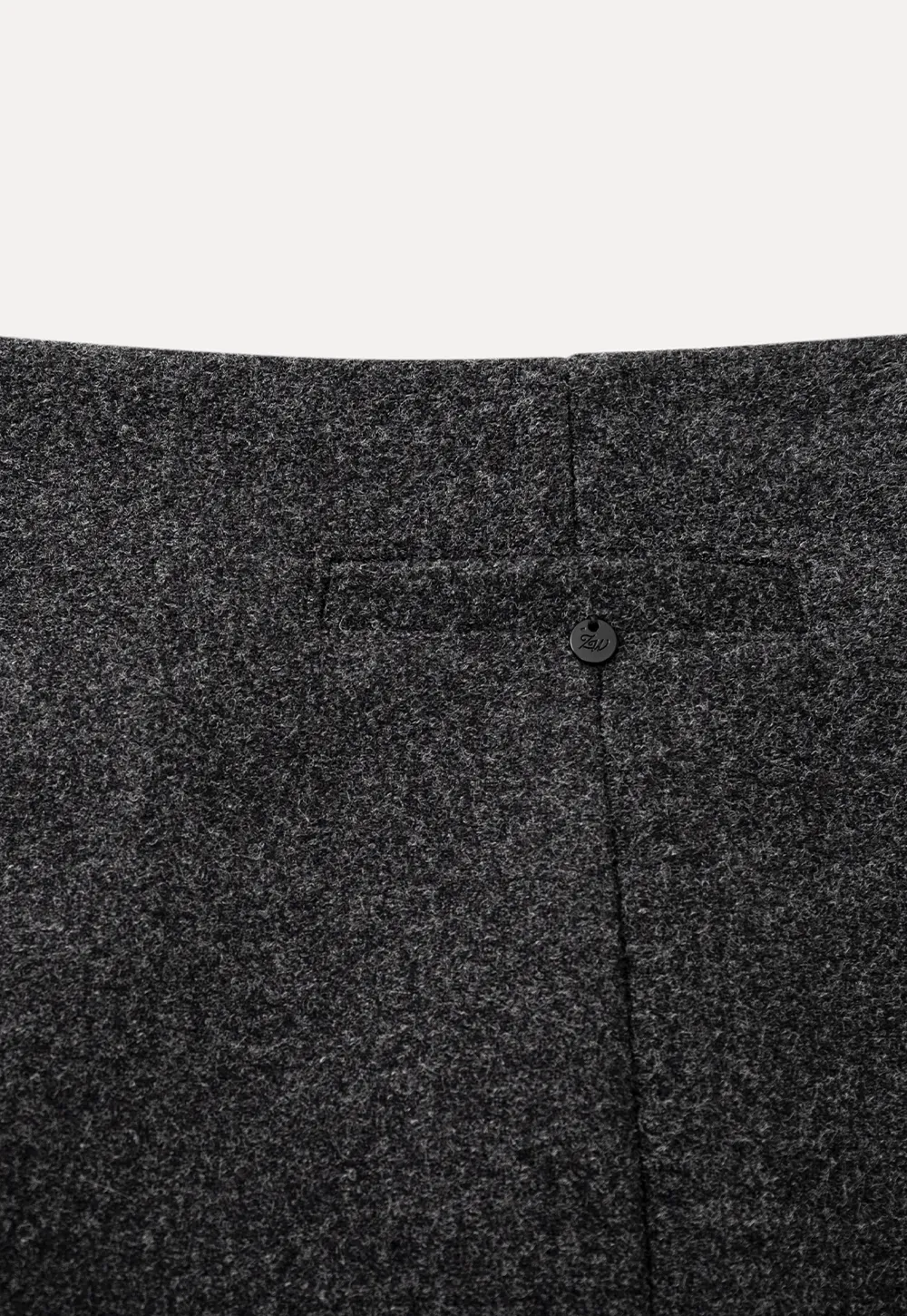 A-line mini skirt with textured fabric and central seam design