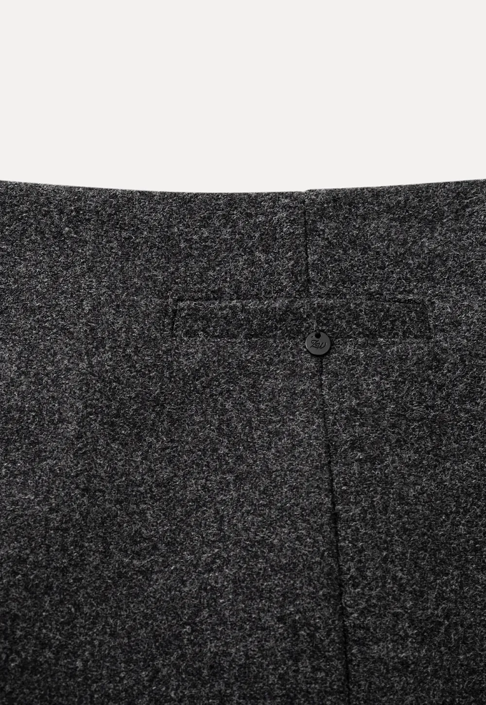 A-line mini skirt with textured fabric and central seam design