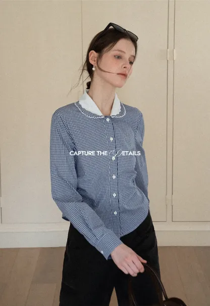 Elegant blouse with scalloped collar and long sleeves for versatile styling