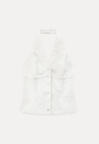 Halter neck sleeveless top with buttons and pleated skirt