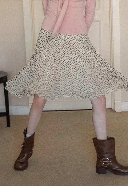 Flowing hem leopard print skirt with ruffle details