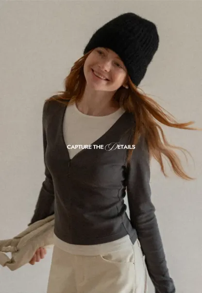 Long sleeve crop top with round neck and hem stitching design