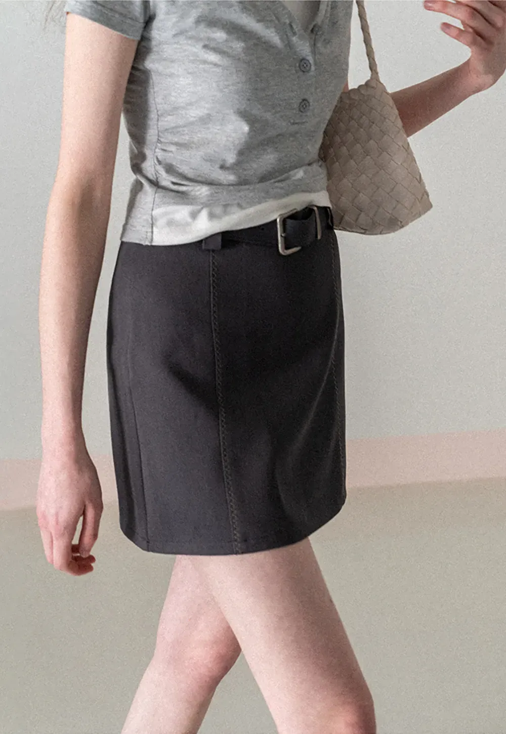 A-line mini skirt with contrast stitching and belt