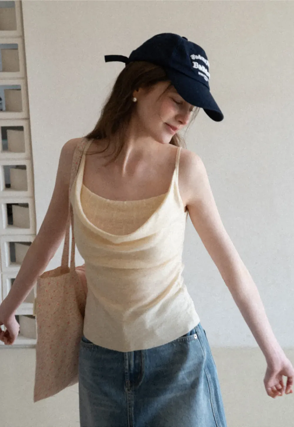 Silk-like tank top with thin straps and draped neckline