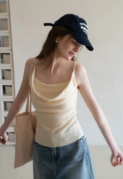 Silk-like tank top with thin straps and draped neckline