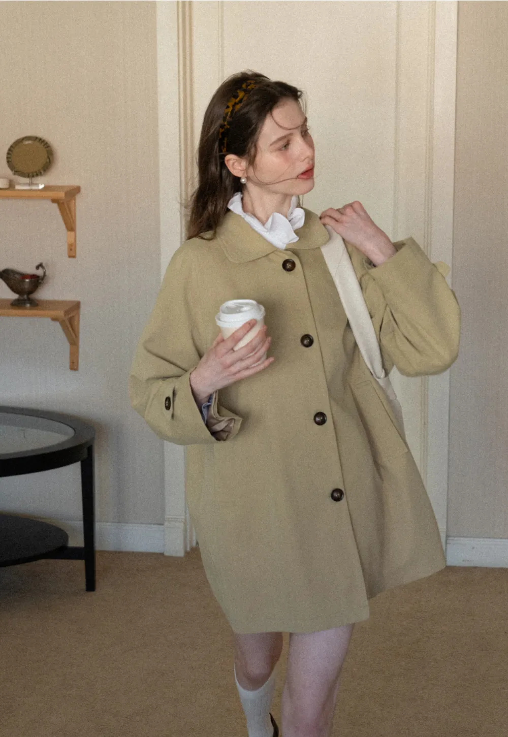 Elegant Trench Coat with Button Detailing and Pockets