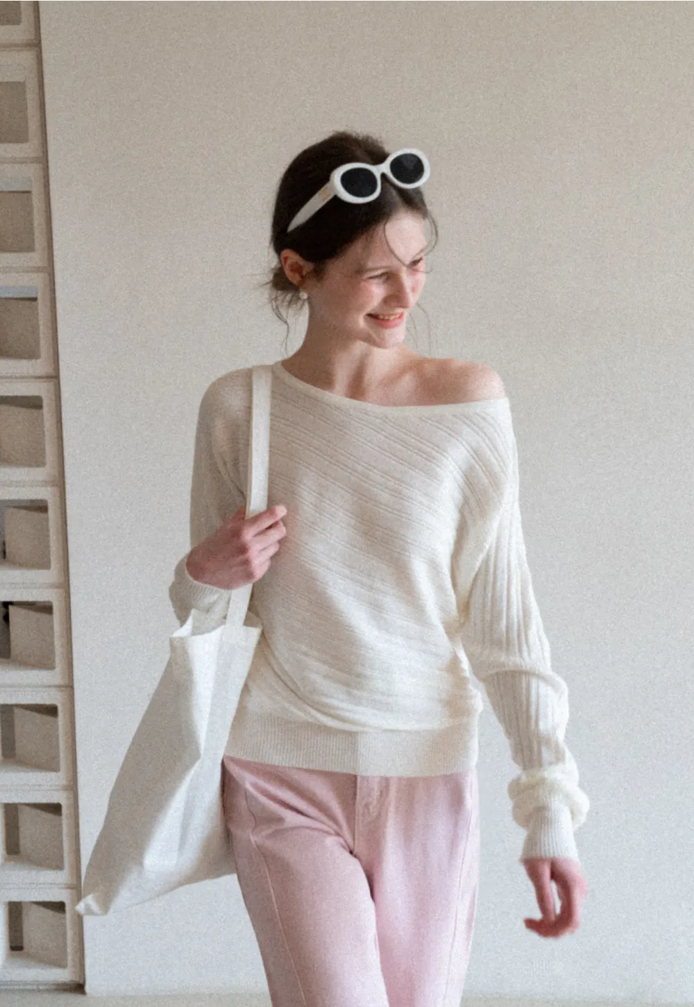 Ribbed knit sweater with wide neckline and long sleeves