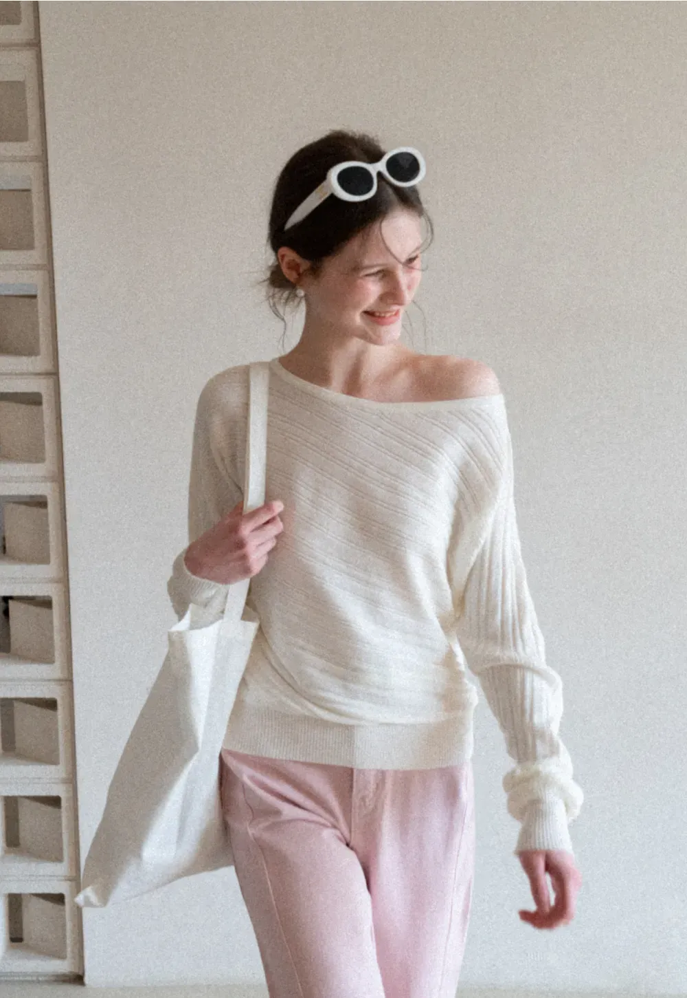 Ribbed knit sweater with wide neckline and long sleeves