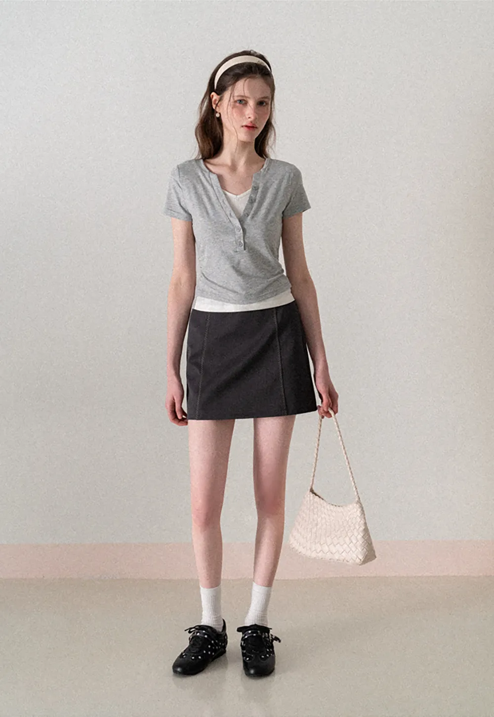 A-line mini skirt with contrast stitching and belt