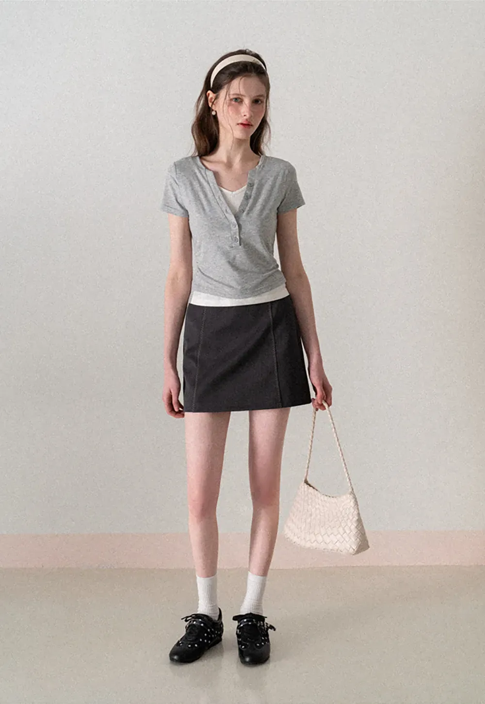 A-line mini skirt with contrast stitching and belt