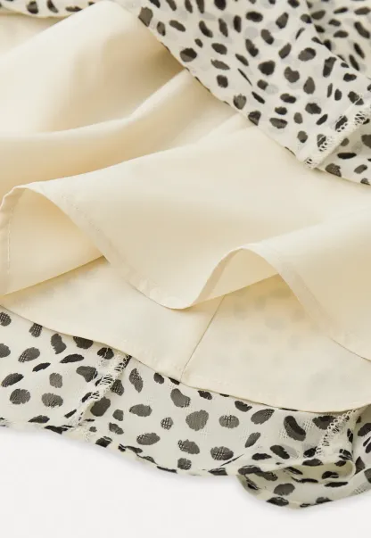 Flowing hem leopard print skirt with ruffle details