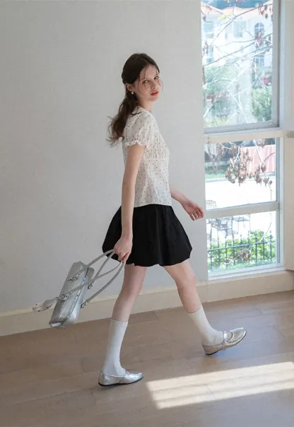 Polka dot shirt with ruffled sleeves and Peter Pan collar