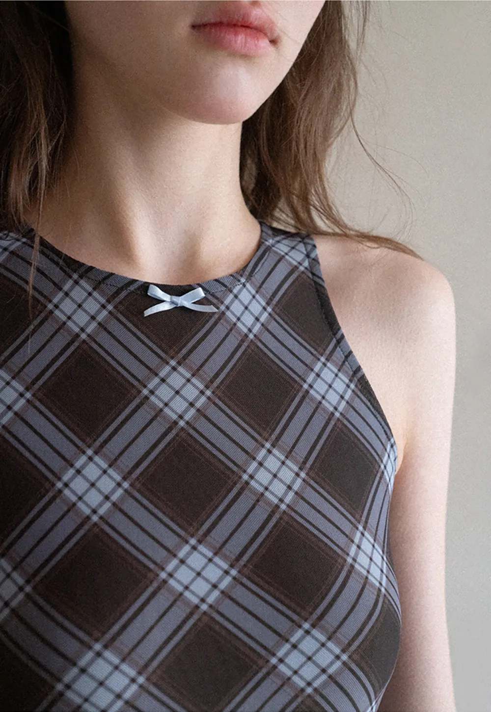 Plaid sleeveless dress with flared skirt