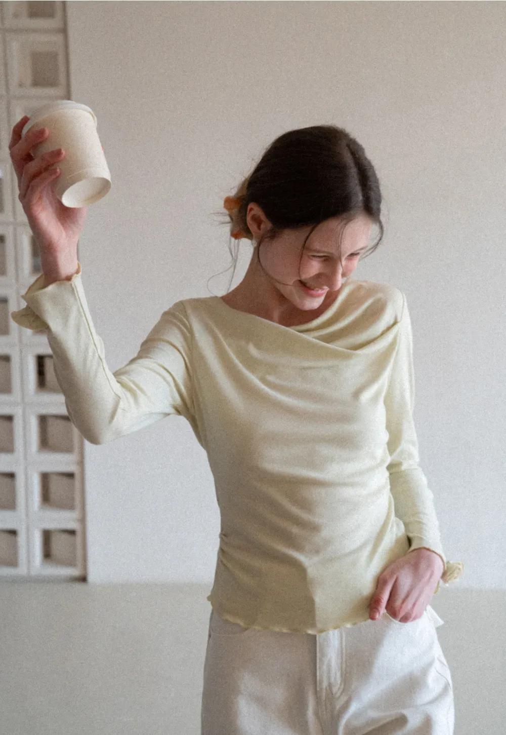 Long sleeve top with ruffled hem and cuffs