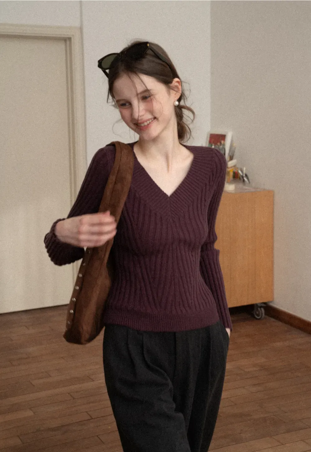 Elegant Ribbed Knit Sweater with V-Neck Design