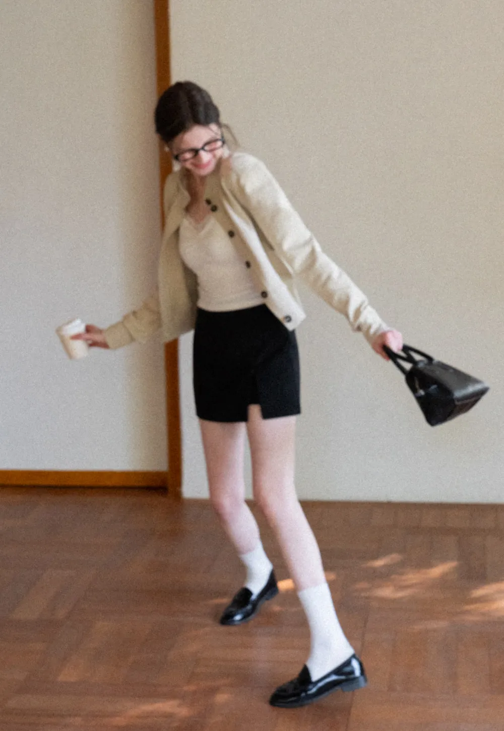 Short jacket with button front and ribbed cuffs