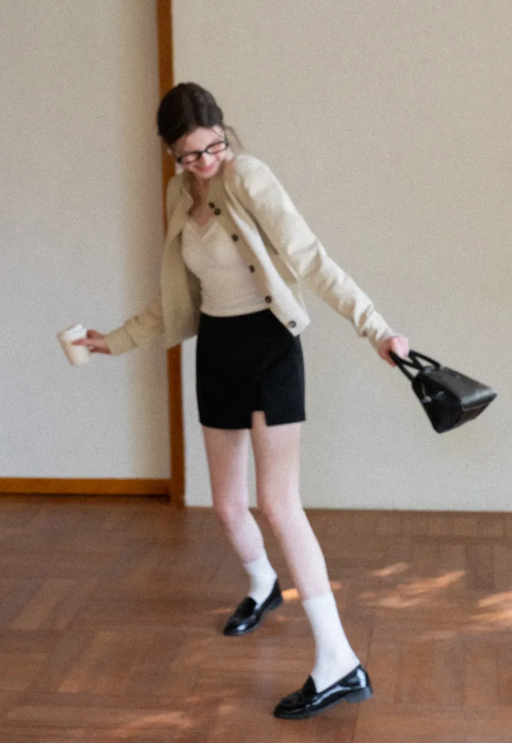 Short jacket with button front and ribbed cuffs