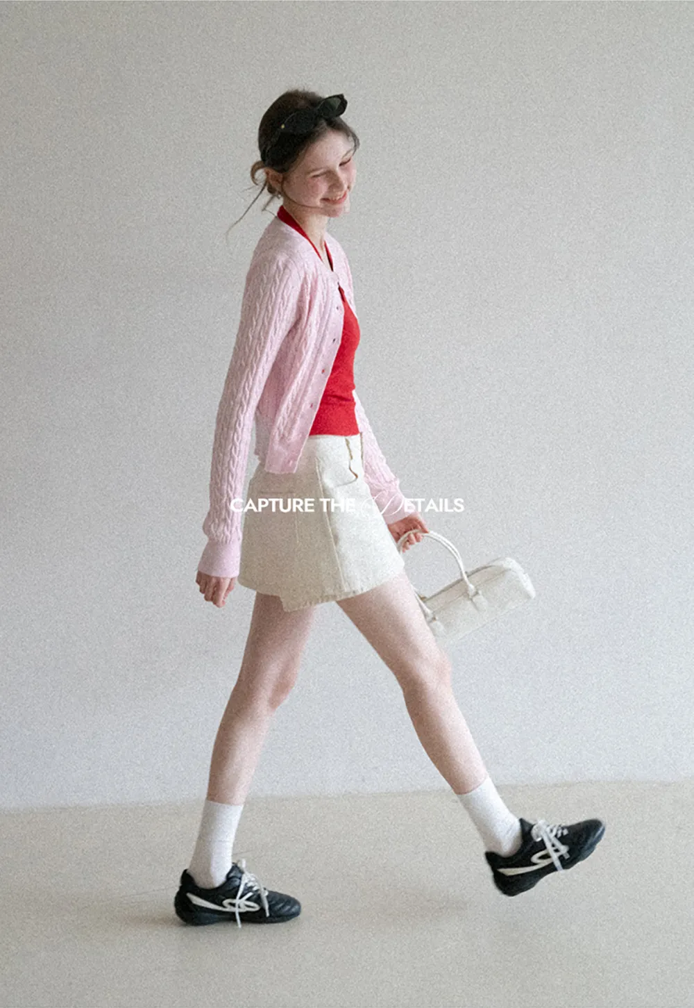 High waist pleated mini skirt with button front design