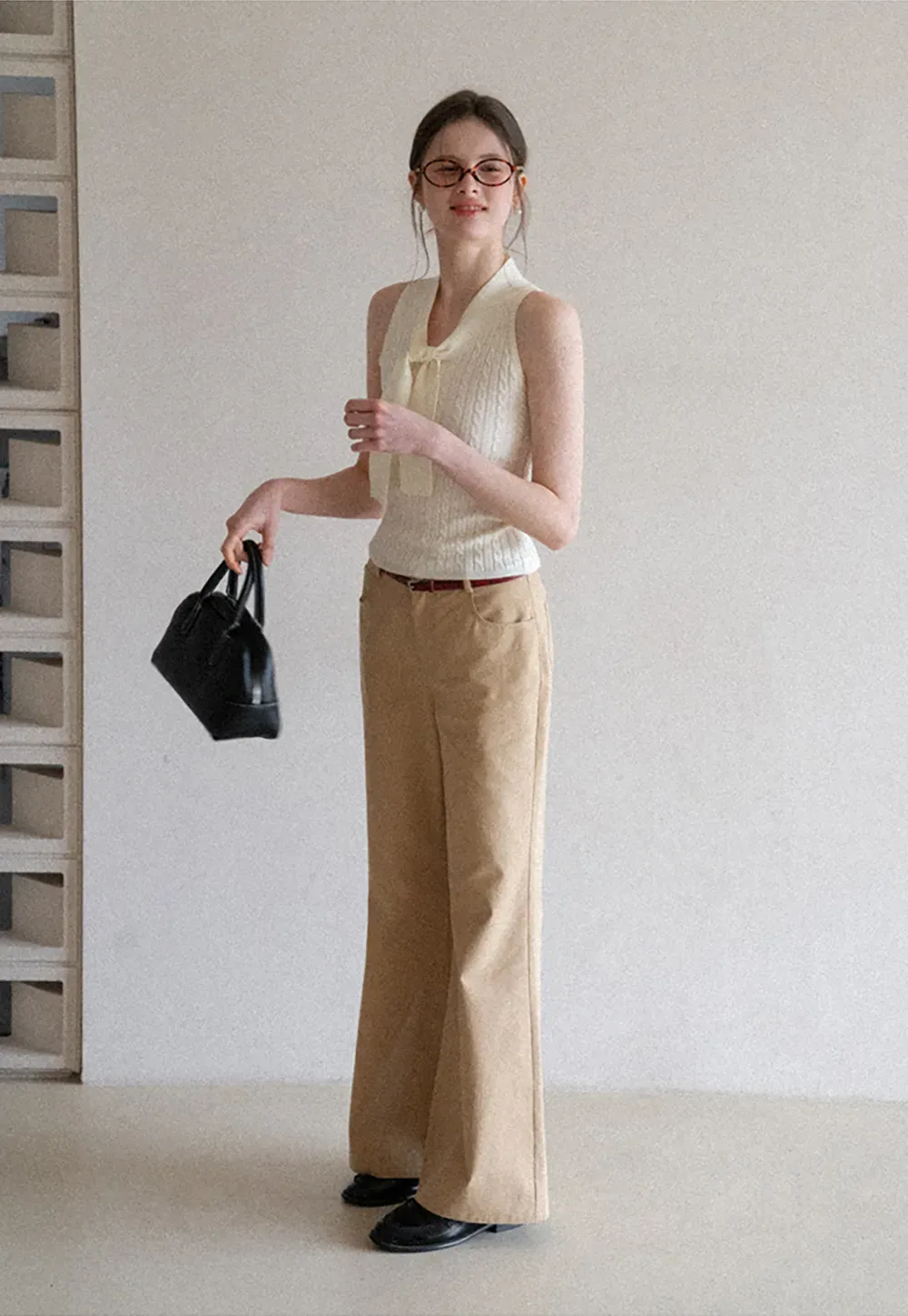 Knit Sleeveless Top with Front Bow Detail