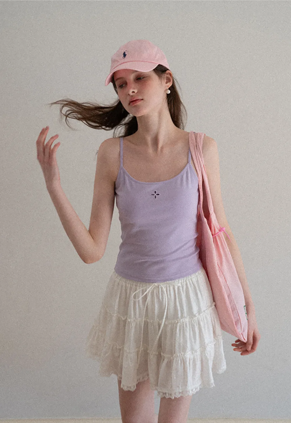 Gray tank top with small embroidered cross detail