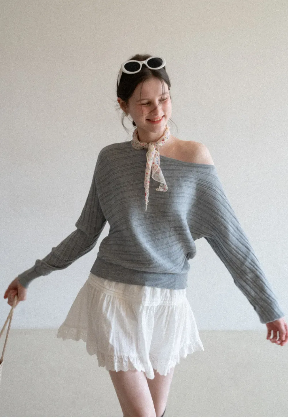 Ribbed knit sweater with wide neckline and long sleeves