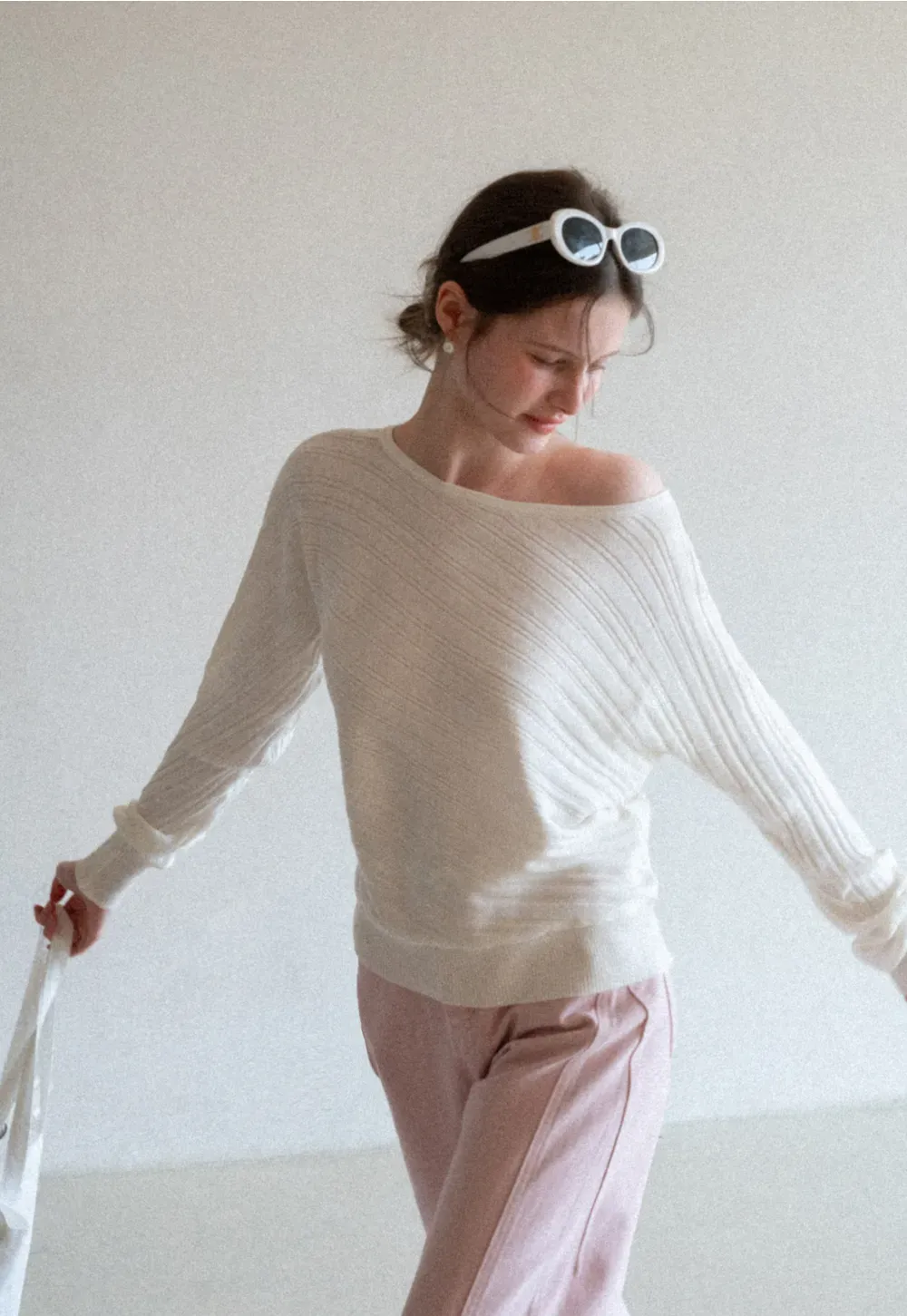 Ribbed knit sweater with wide neckline and long sleeves