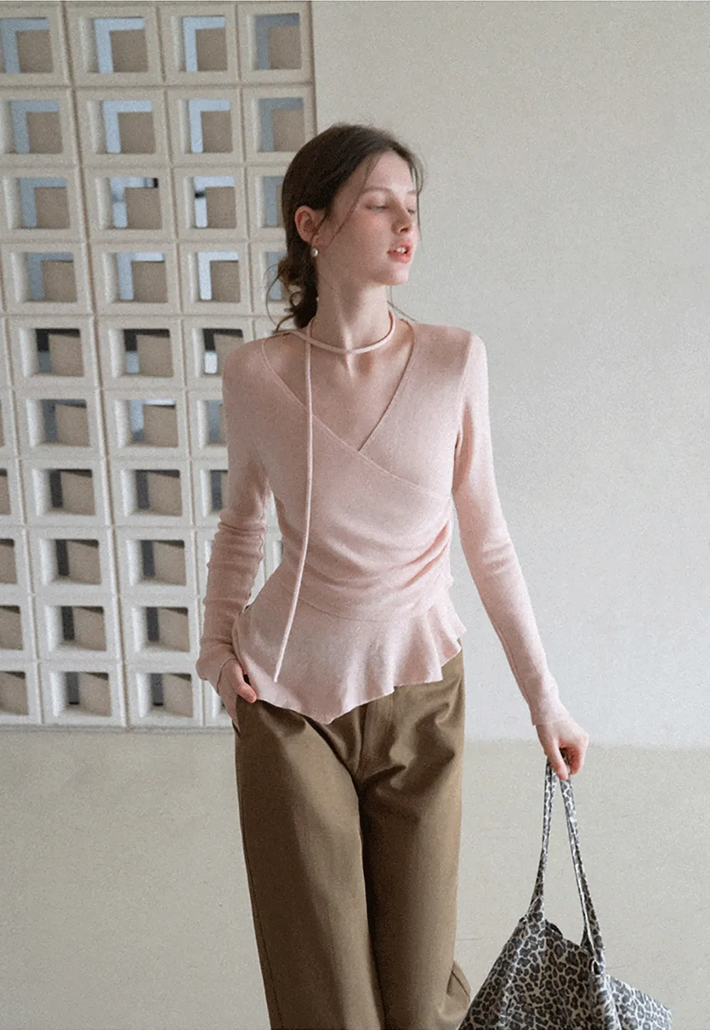 Long sleeve wrap knit sweater with ruched detail