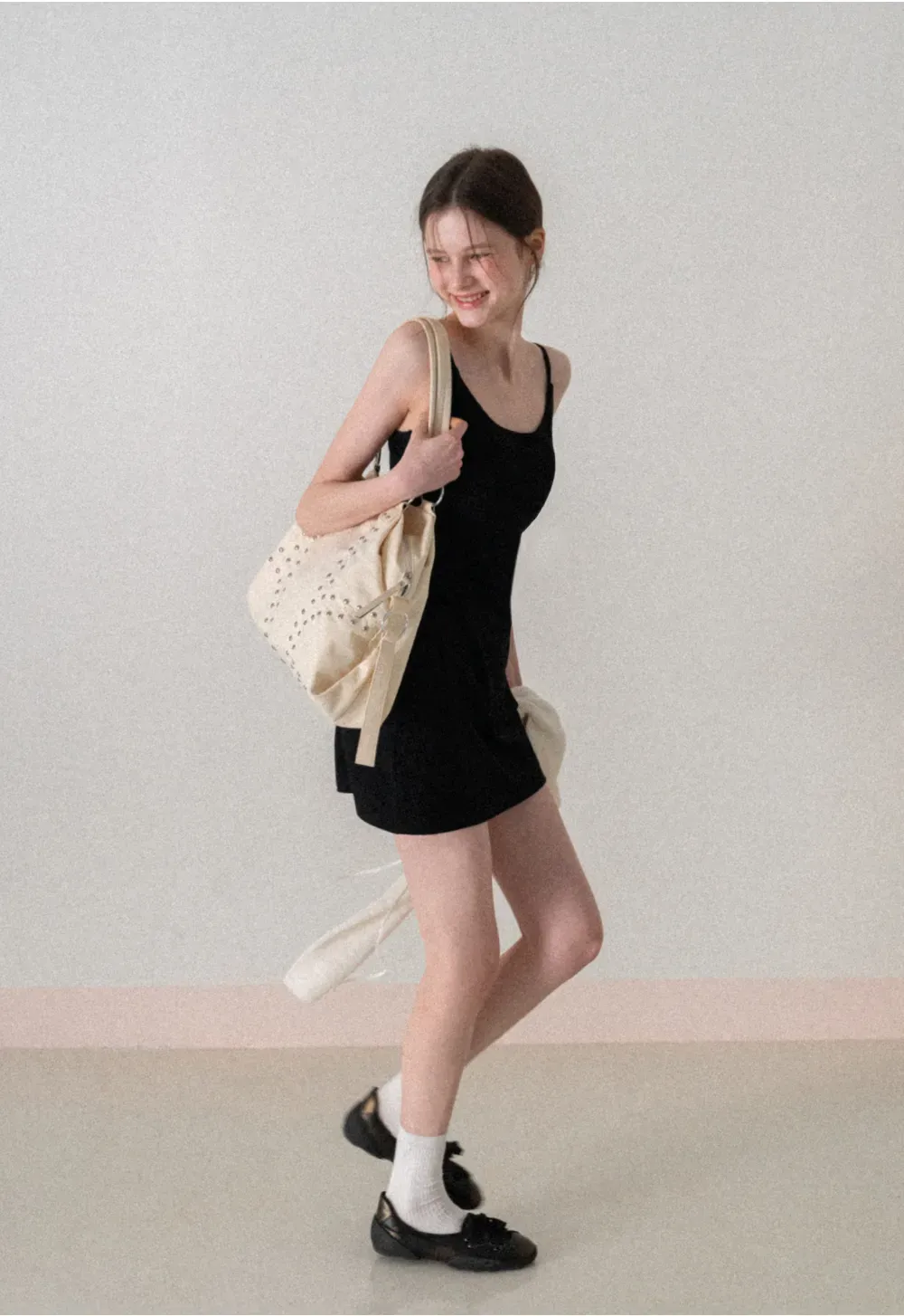 Sleeveless fitted mini dress with thin straps