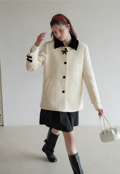 Elegant Wool Coat with Bow Detail and Contrasting Collar