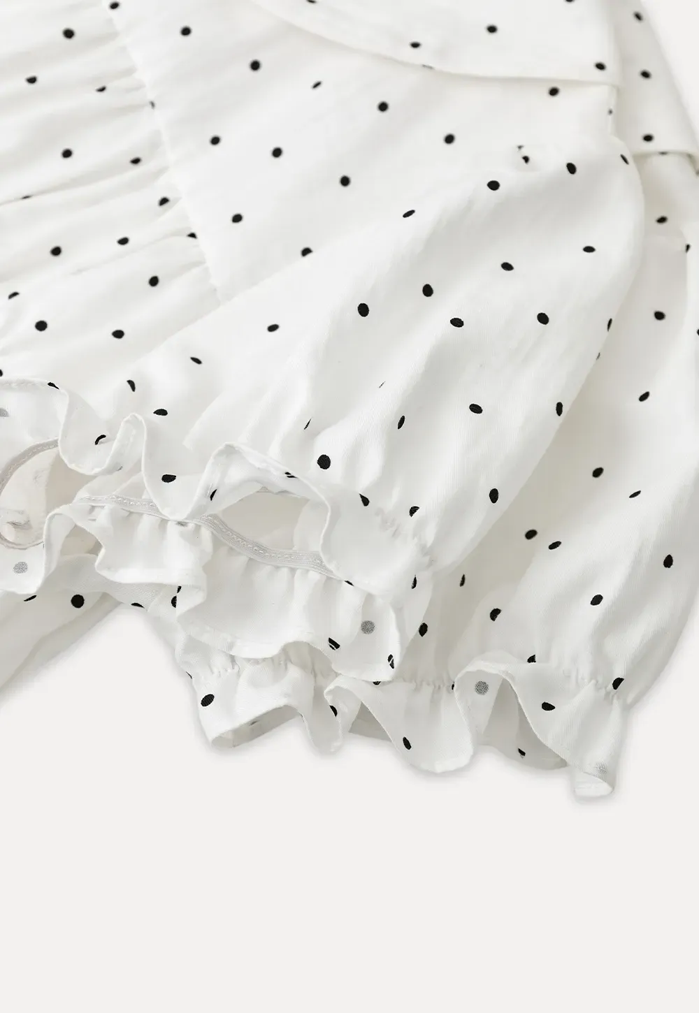 Polka dot shirt with ruffled sleeves and Peter Pan collar