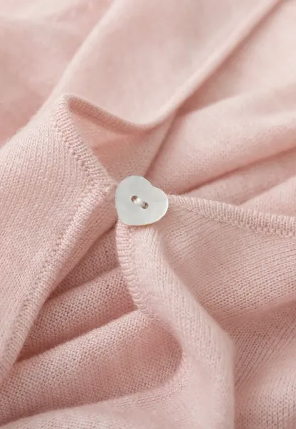 Woolen knit sweater with tie front and floral tank top