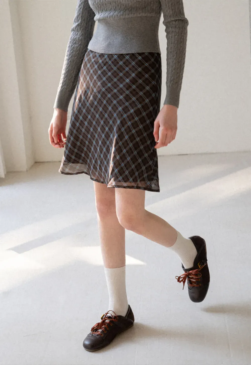 Plaid Skirt with Flowy Hem Design