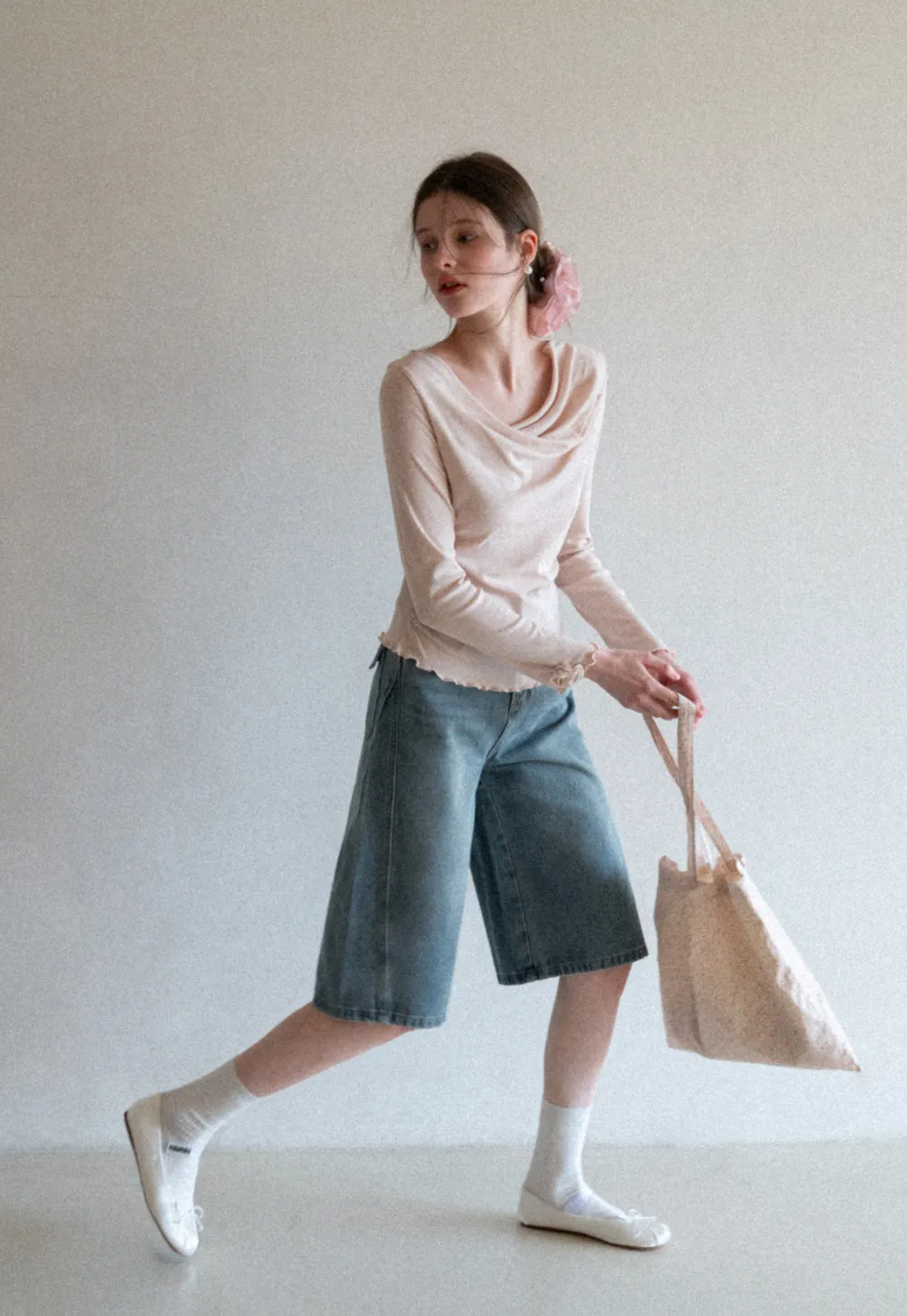 Long sleeve top with ruffled hem and cuffs