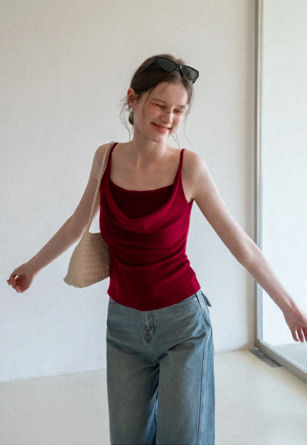 Silk-like tank top with thin straps and draped neckline