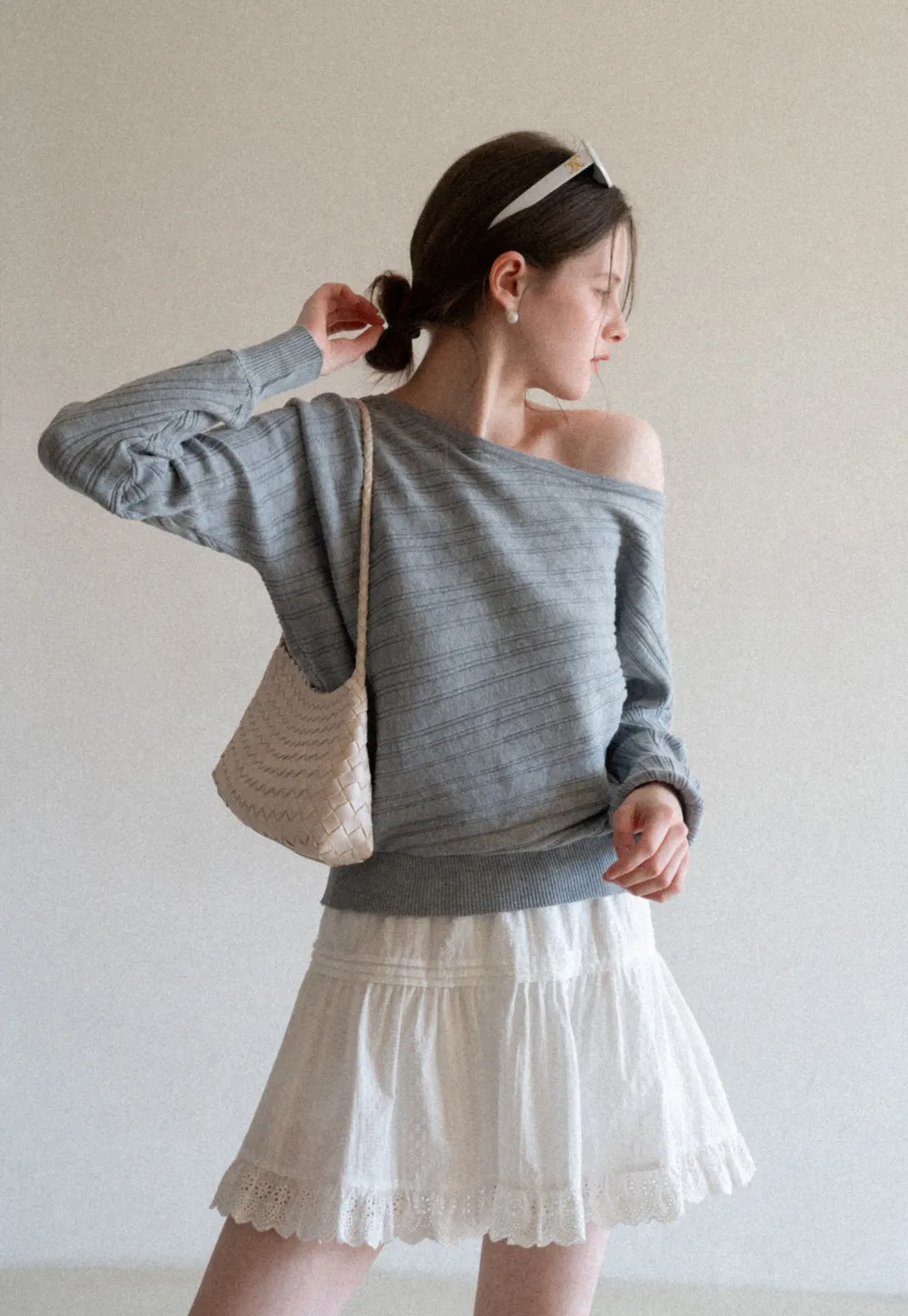 Ribbed knit sweater with wide neckline and long sleeves