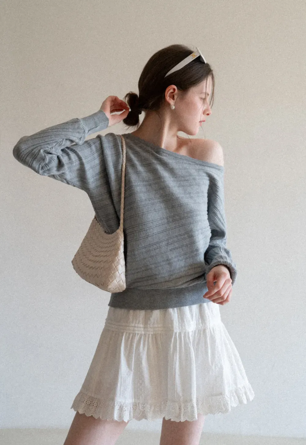 Ribbed knit sweater with wide neckline and long sleeves