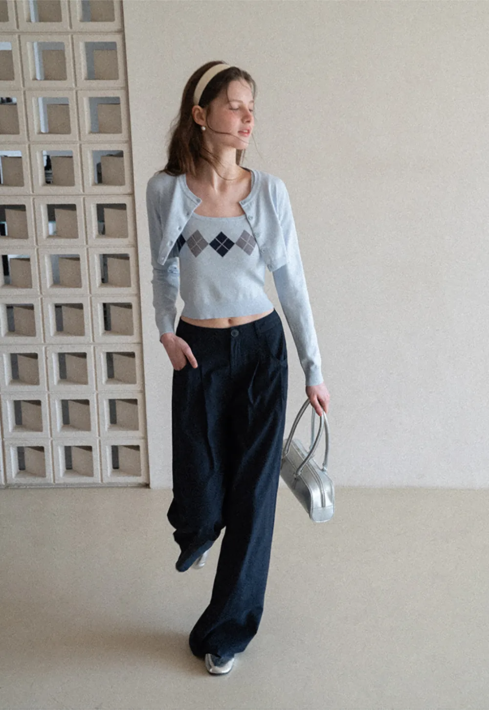 Woolen knit sweater with argyle pattern and buttons