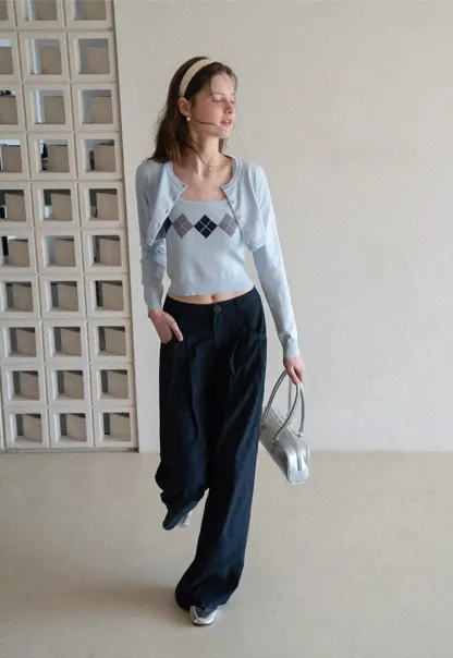 Woolen knit sweater with argyle pattern and buttons