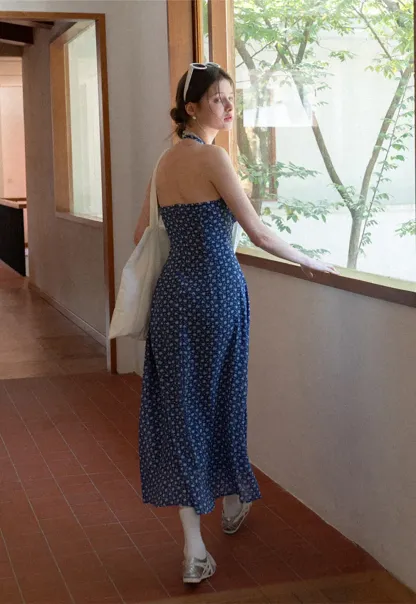 Halter neck dress with floral print and lace trim