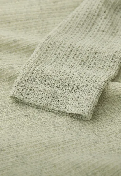 Long sleeve knit top with back tie detail