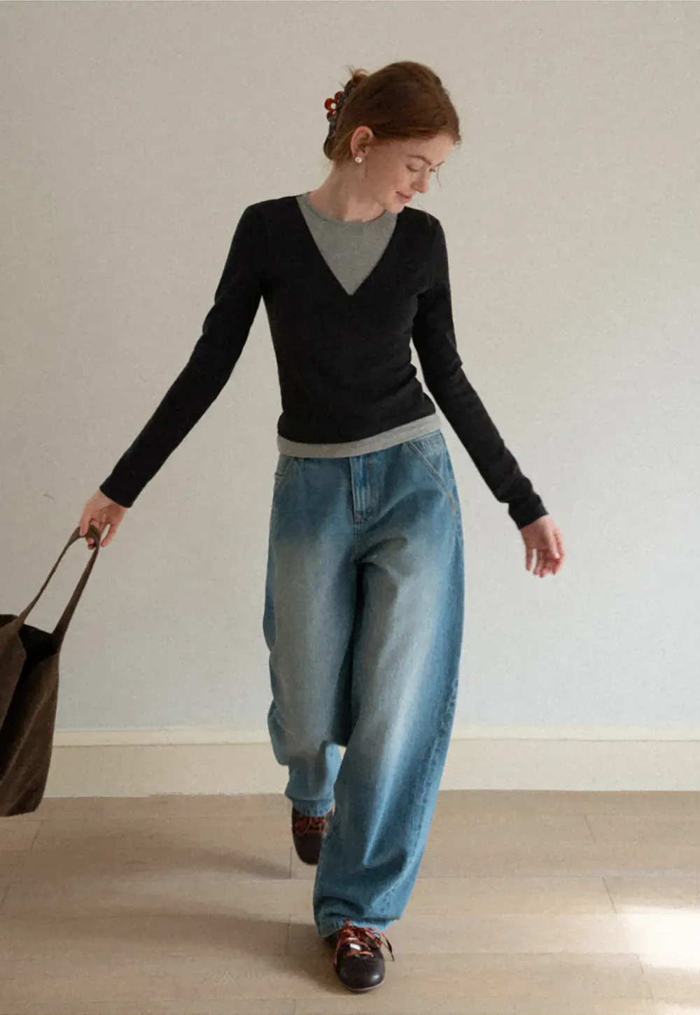 Long sleeve crop top with round neck and hem stitching design