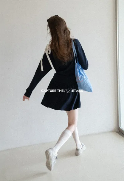 Long sleeve top with bow detail and mini skirt set