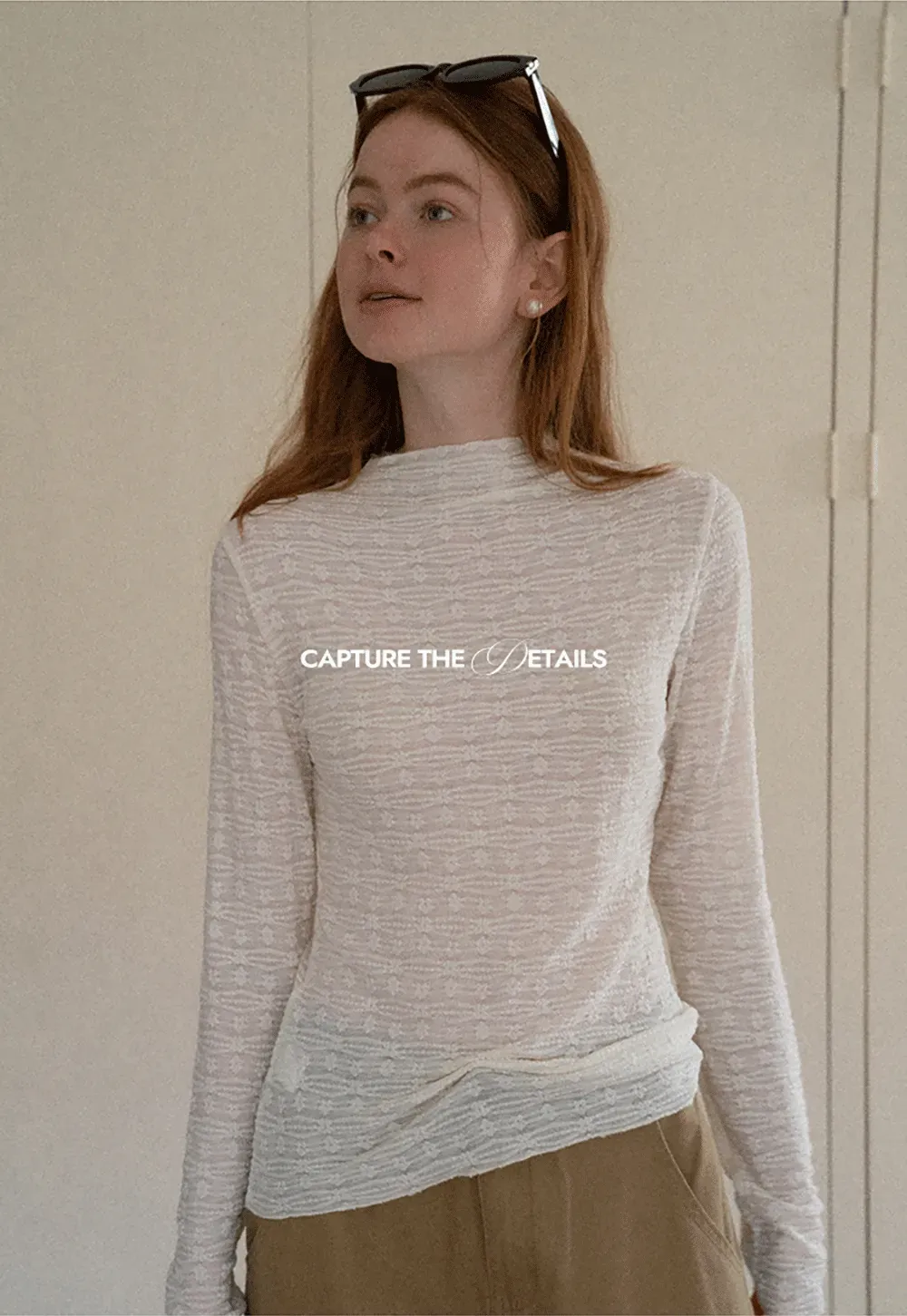 Elegant textured long sleeve top with subtle pattern design