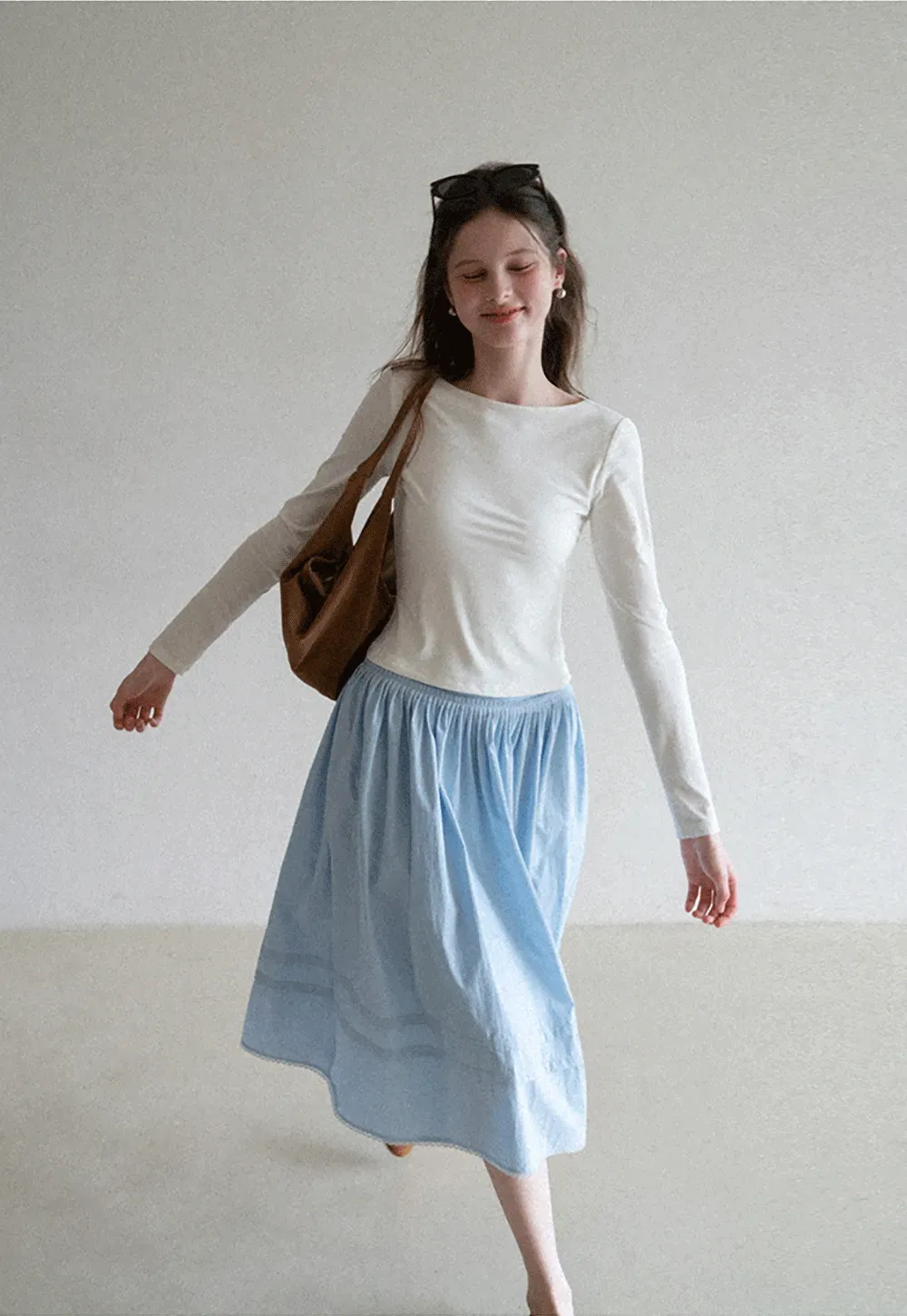 Lightweight pleated midi skirt with elastic waist
